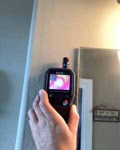 Handheld thermal imaging device in use